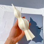 Double-bulb spindle casting held in one hand