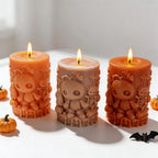 Halloween pillars showing raised pumpkins and doll faces