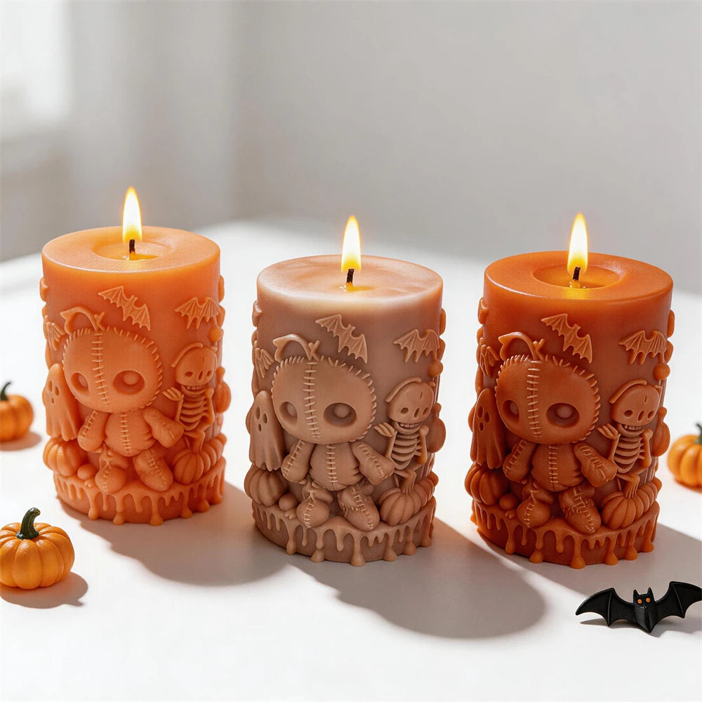 Halloween pillars showing raised pumpkins and doll faces