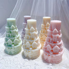 Pastel castle tower castings on a lace-covered display