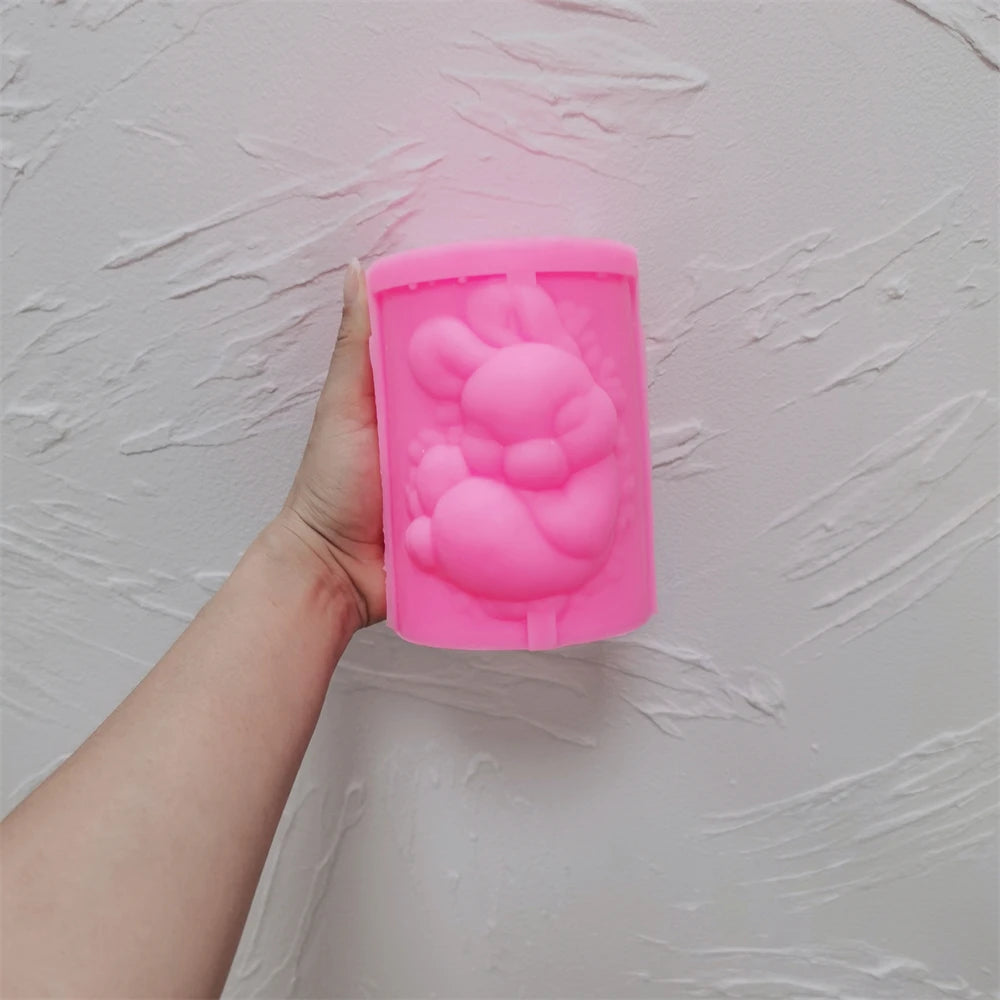 Pink silicone pillar mold with raised rabbit cameo cavity
