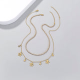 Shine Bright with our 14k Gold Plated Star Charm Layered Necklace Obsesie