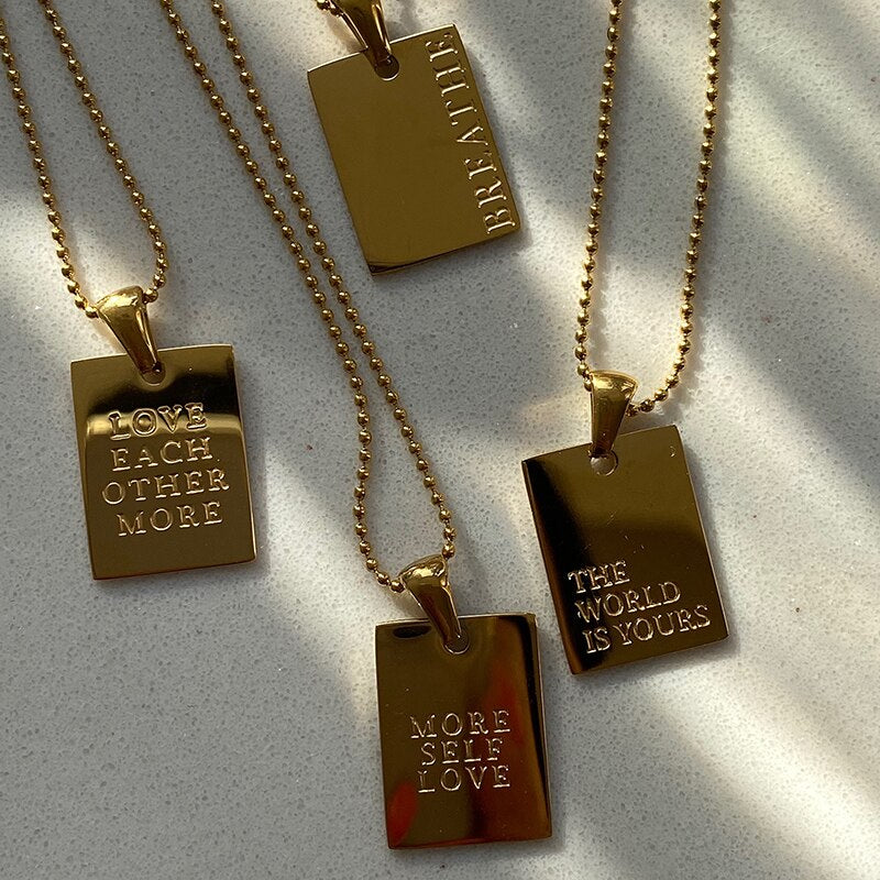 The World is Yours Necklace Inspirational Tag Necklaces Obsesie